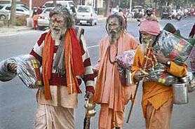 Sadhus buying woollens at Chandigarh to get respite from cold.