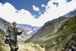 A troop mans the Pir Panchal range in south Kashmir. Security experts experts say that replacing the army with the police can be a threat to national security.