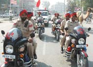 Policemen taking out a flag march in Bathinda. 