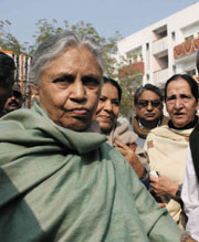 Delhi Chief Minister Sheila Dikshit interacts with people after handing over 32 flats to the NDMC employees on Tuesday.
