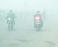 With thick fog engulfing the city, early morning commuters had a tough time on Tuesday.