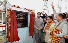 Minister for roads and buildings Gulchain Singh Charak lays foundation stone of a community hall at Channi Himmat in Jammu on Tuesday. 