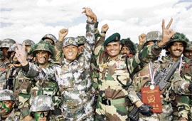 Commander of the Indian contingent Col J.S. Budhwar, his Chinese counterpart and troops of both sides pose for a photo at the closing ceremony of Hand-in-Hand, a joint Sino-Indian anti-terrorism exercise in Kunming on Tuesday.