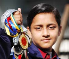 A Proud collection: Suxam Singla showing her medals in Bathinda on Wednesday.