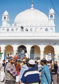 A crowd gathers at the Kalandri Gate mosque to protest against the alleged sale of the Chand Sarai mosque in Karnal on Wednesday.