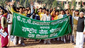 NSS volunteers of DAV PG College take part in a jan chetna rally in Karnal on Wednesday.