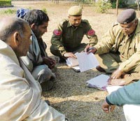 Jagpal Singh (second from left), father of the rape victim, files complaint with the police at Jagadhri civil hospital on Wednesday.