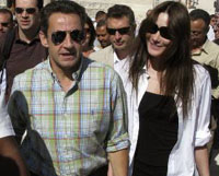 French President Nicolas Sarkozy and his girlfriend, former supermodel Carla Bruni, walk together during a visit to the Valley of the Kings, near Luxor, on Wednesday. Sarkozy is in Egypt on a private visit.