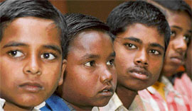 Child labourers, who were rescued from a brick-kiln in Jhajjar by the Bachpan Bachao Andolan, an NGO, look on during a press conference in New Delhi on Thursday. 