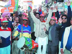 The BJP supporters in Bathinda celebrating their partys victory in Himachal Pradesh on Friday. The BJP secured a majority of the seats. 