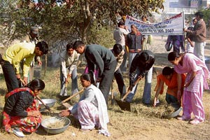 NSS volunteers of Chhaju Ram Memorial Jat College, Hisar, take part in a cleanliness drive on the Red Cross Society premises on Friday.