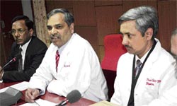 The PGIMS director, Prof S.S. Sangwan (centre), and the principal of Dental College, Dr Sanjay Tewari (right), address a news conference at the PGIMS in Rohtak on Friday.