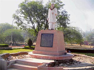 In the absence of proper upkeep, broken bricks lie scattered around a statue of Lal Bahadur Shastri on the Sirsa road in Hisar.
