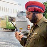 Amritsar-Lahore-Nankana Sahib bus at the international bus terminus in Amritsar on Friday.
