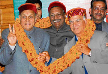 Prem Kumar Dhumal, Shanta Kumar and Satya Pal Jain after the first meeting of the newly elected BJP MLAs at Peter Hoff in Shimla on Saturday.