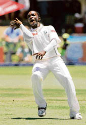 West Indies Fidel Edwards rejoices after getting rid of South Africas Graeme Smith