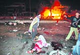 Bloody return: Bomb blasts greet Benazir Bhutto in Pakistan