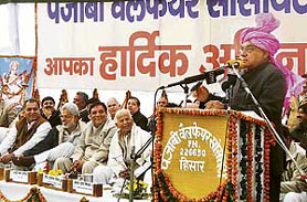 Haryana Chief Minister Bhupinder Singh Hooda addresses a gathering after laying the foundation stone of Punjabi Bhawan in Hisar.