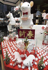 Stuffed dolls of mice are displayed at a Tokyo toy shop to celebrate the upcoming "Year of the Rat", on Monday.