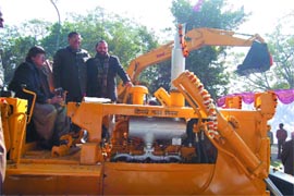 Delhi Mayor Arti Mehra examines earth moving equipment added to the sanitation fleet of the MCD in the Capital on Monday.