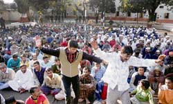 Away from their near and dear ones, inmates of the District Jail dance to the beats of music on New Year Eve in Jammu on Monday.