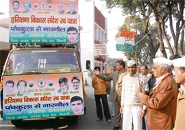 Chief Minister Bhupinder Singh Hooda flags off the Haryana vikas sandesh rath yatra from his residence in Chandigarh on Tuesday.