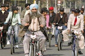 People participate in a cycle rally organised by the British Library in collaboration with STEPS in Chandigarh