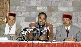 State BJP president Jai Ram Thakur (centre) addresses a press conference in Shimla on Wednesday.