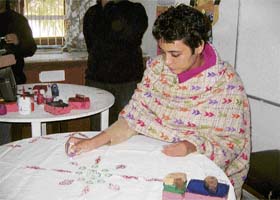 Former model Gitanjali Nagpal tries her hand at fabric painting at Vidya Devi Jindal Girls School in Hisar