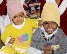 Two children enjoy themselves at the Shradhanand orphanage in Karnal