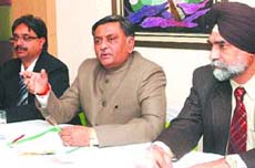 Local bodies minister Manoranjan Kalia interacts with mediapersons in Jalandhar. 