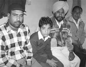 Kunal, a boy from Patiala, who rescued himself from kidnappers, at a police station in Ambala on Thursday. 