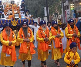 The Panj Pyaras lead a nagar kirtan on the eve of the birth anniversary of Guru Gobind Singh in Jalandhar on Thursday.