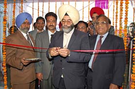 Additional deputy commissioner (development) Kanwar Sher Singh Dhanju inaugurates a branch of the Bank of India in Kapurthala.