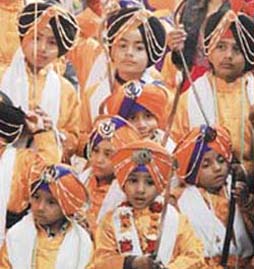 Young devotees at a nagar kirtan in Ludhiana on Thursday.