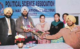 Dr Kuldeep Singh being welcomed at the post-graduate department of political science of Guru Nanak National College, Doraha, on Thursday.