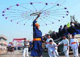 A boy performing the traditional martial art Gatka on Friday.