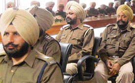 Police officers attend a seminar on road safety, organised by the Punjab traffic police in Mohali on Friday.