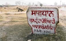 A caution sign on the newly constructed bridge. 