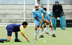 A match in progress between Ferozpur and Faridkot during the Punjab hockey league at the PAU