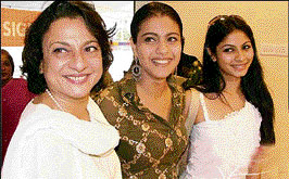 Tanuja (with daughters Kajol and Tanisha) is happy with her new role