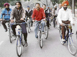 Journalists take part in a cycle rally to raise awareness on healthy living and pollution in Chandigarh on Sunday.