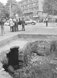 A damaged manhole on the road opposite the Punjab School Education Board poses a grave risk to pedestrians and motorists. 