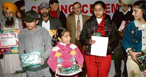 Winners of various competitions with their awards on the concluding day of the 19th road safety week at Traffic Auditorium, Sector 29, Chandigarh, on Monday.