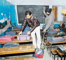 An anti-sabotage team of the Ludhiana police searches a classroom of Lal Bahadur Shastry School at Milar Ganj in Ludhiana.