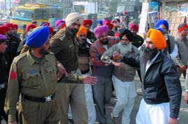 Activists of SAD (A) being rounded up by police personnel in Bathinda on Monday. 