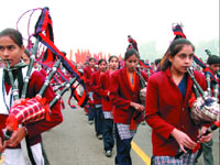 Schoolchildren rehearse ahead of the Republic Day parade at Rajpath in the Capital on Tuesday.