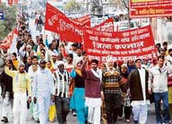 Activists of the Sarva Karamchari Sangh protest against government policies in Karnal