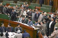 The legislators of opposition parties lodge their protest during question hour in the state assembly.
