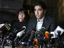 Bilawal Bhutto (right), chairman of the Pakistan People's Party, attends a news conference in London on Tuesday.